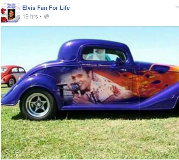 Old car with Elvis painted on side
